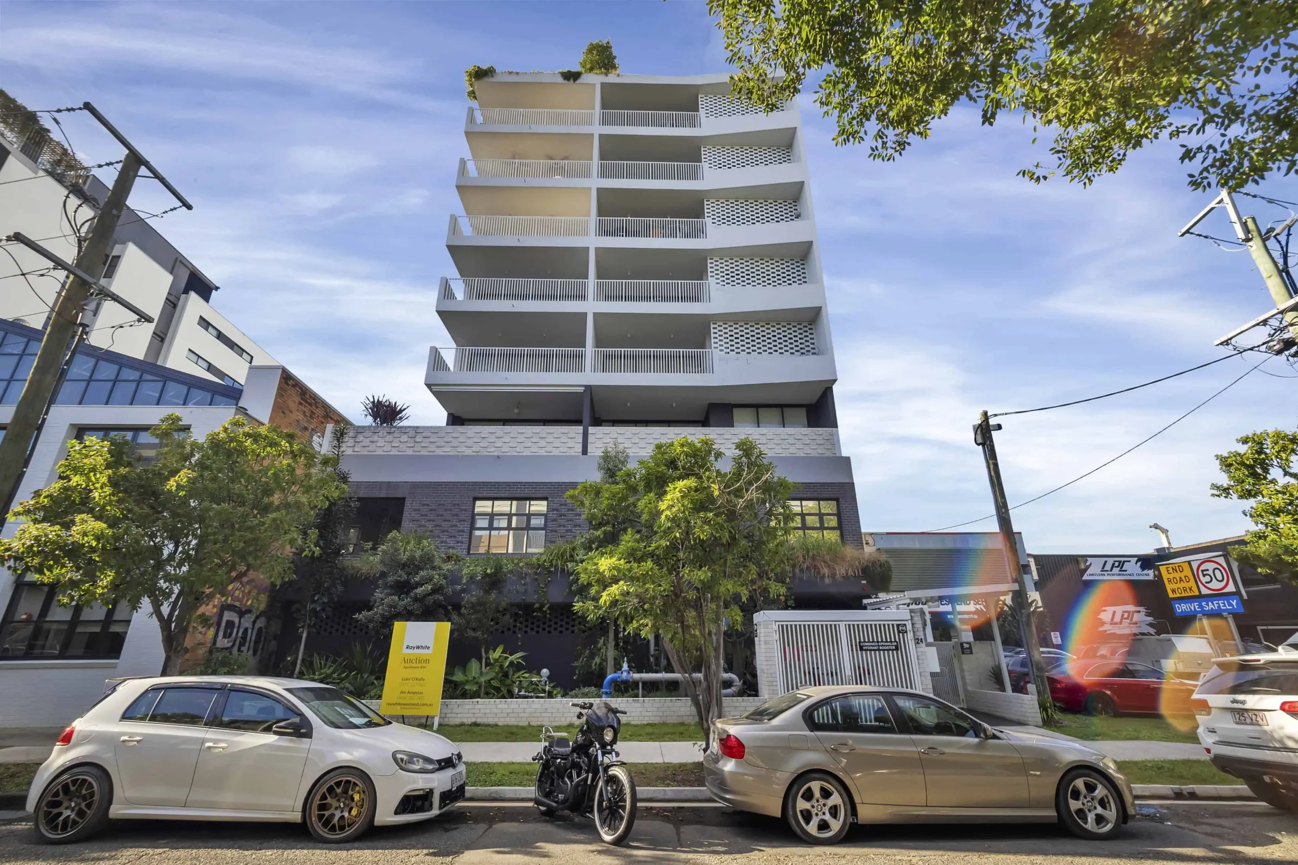 Street view of West End homes high-rise apartments