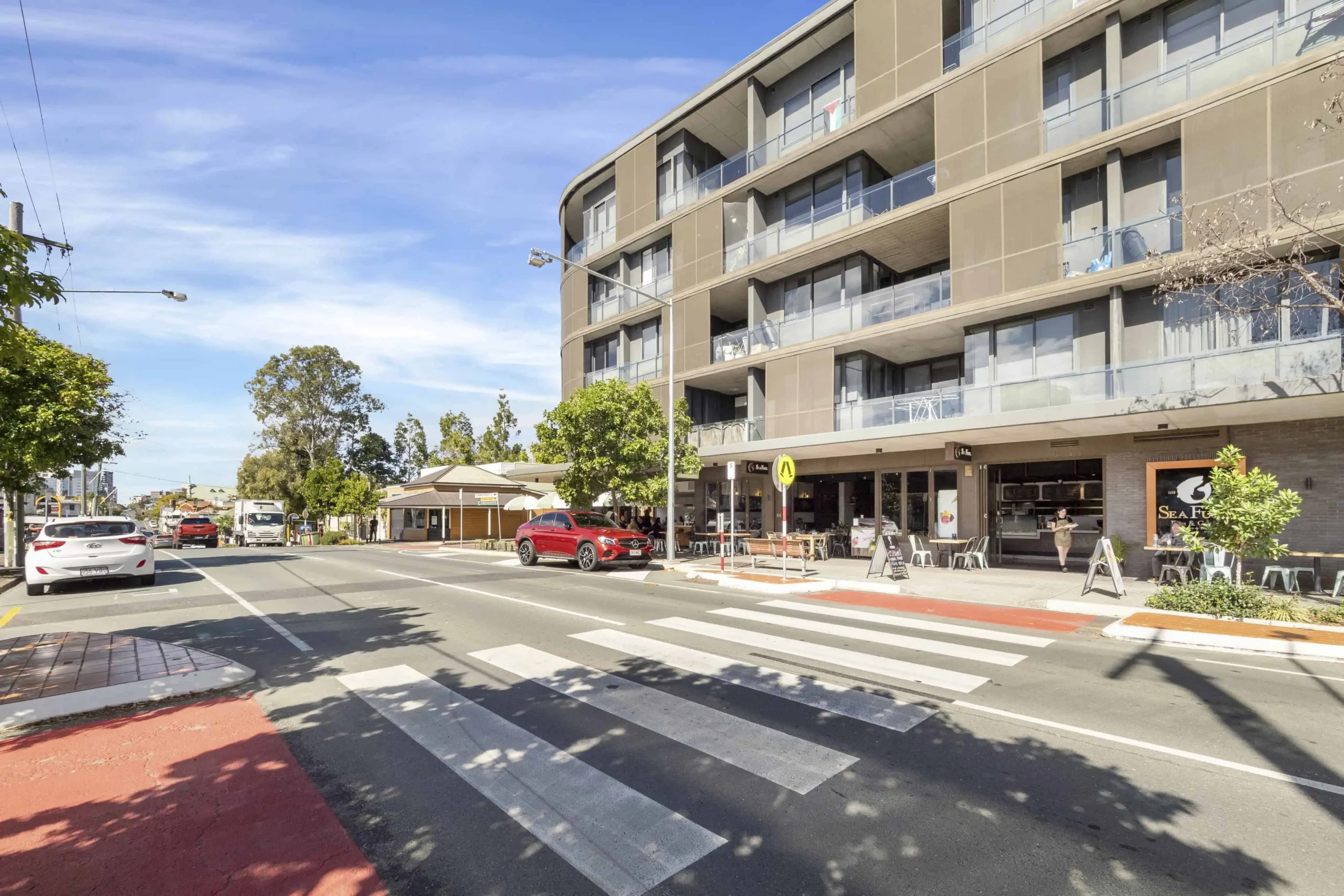 Street view of West End homes and apartments